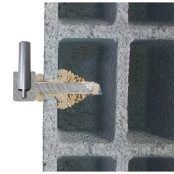 Filtre métallique pour scellement résine dans les matériaux creux